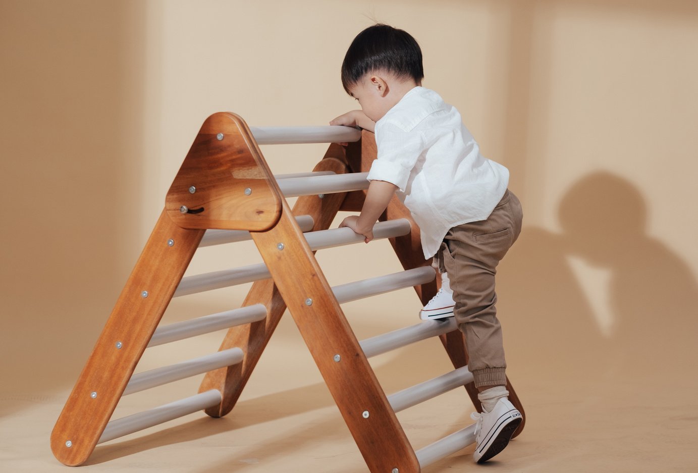 Boy Climbing on Ladder